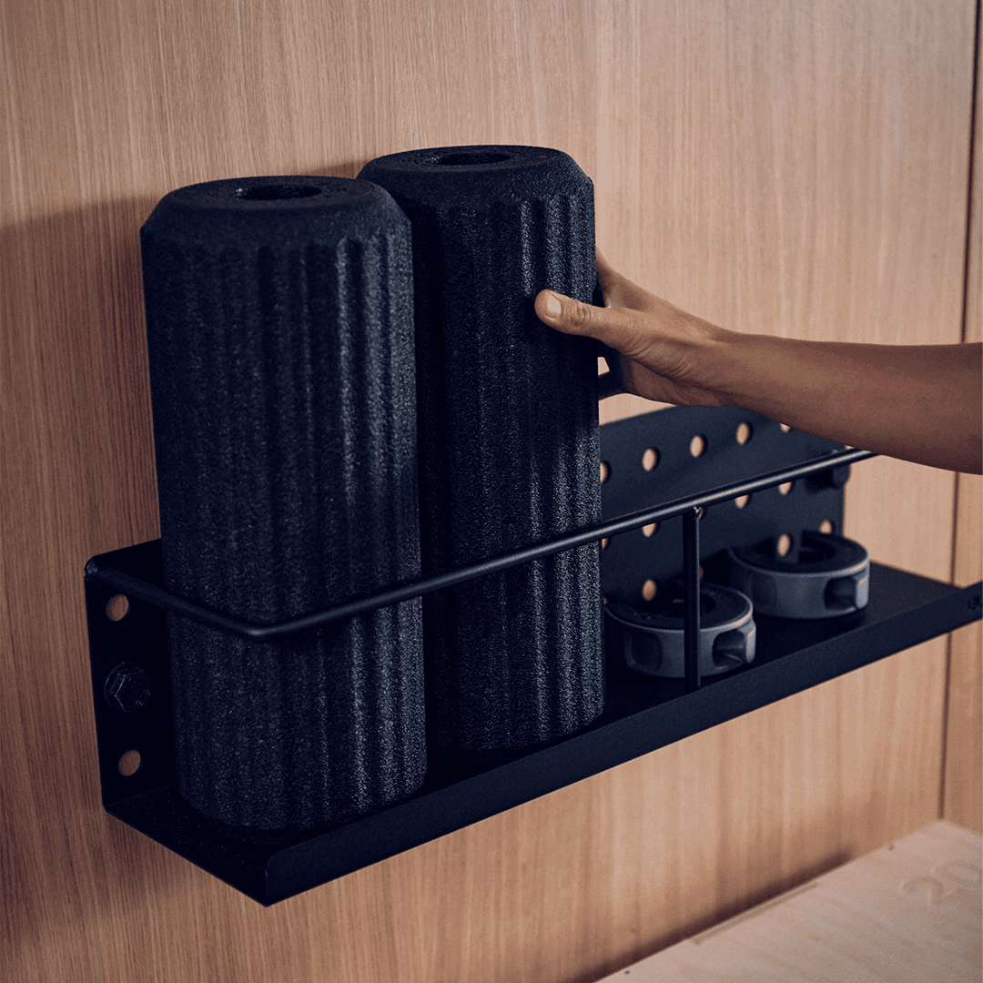 Eleiko foam rollers neatly arranged on a rack for easy access